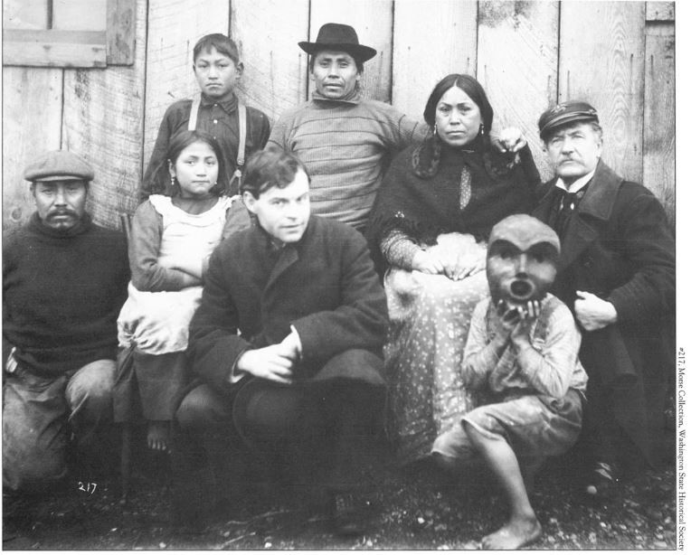 Photograph of CAPT Dorr F. Tozier (right) posing with a group Native Americans. CAPT Tozier fought drug smugglers in the Pacific Northwest for many years, first as Commanding Officer of the Wolcott, and later while in charge of a small flotilla consisting of Revenue Cutter Grant and two small Revenue Cuter Service steam launches. He was also a fervent collector of Native American artifacts, many of which he donated to museums. (Washington State Historical Society) Photograph of CAPT Dorr F. Tozier (right) posing with a group Native Americans. CAPT Tozier fought drug smugglers in the Pacific Northwest for many years, first as Commanding Officer of the Wolcott, and later while in charge of a small flotilla consisting of Revenue Cutter Grant and two small Revenue Cuter Service steam launches. He was also a fervent collector of Native American artifacts, many of which he donated to museums. (Washington State Historical Society)